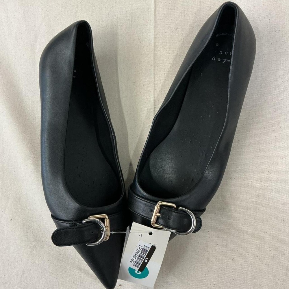 Chic black pointed-toe flats from A New Day